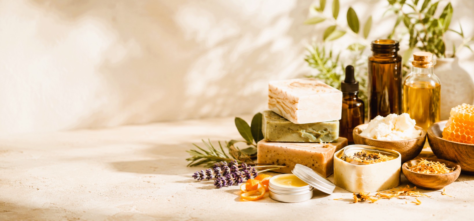 Natural soaps, oils, honeycomb, botanicals, and cream